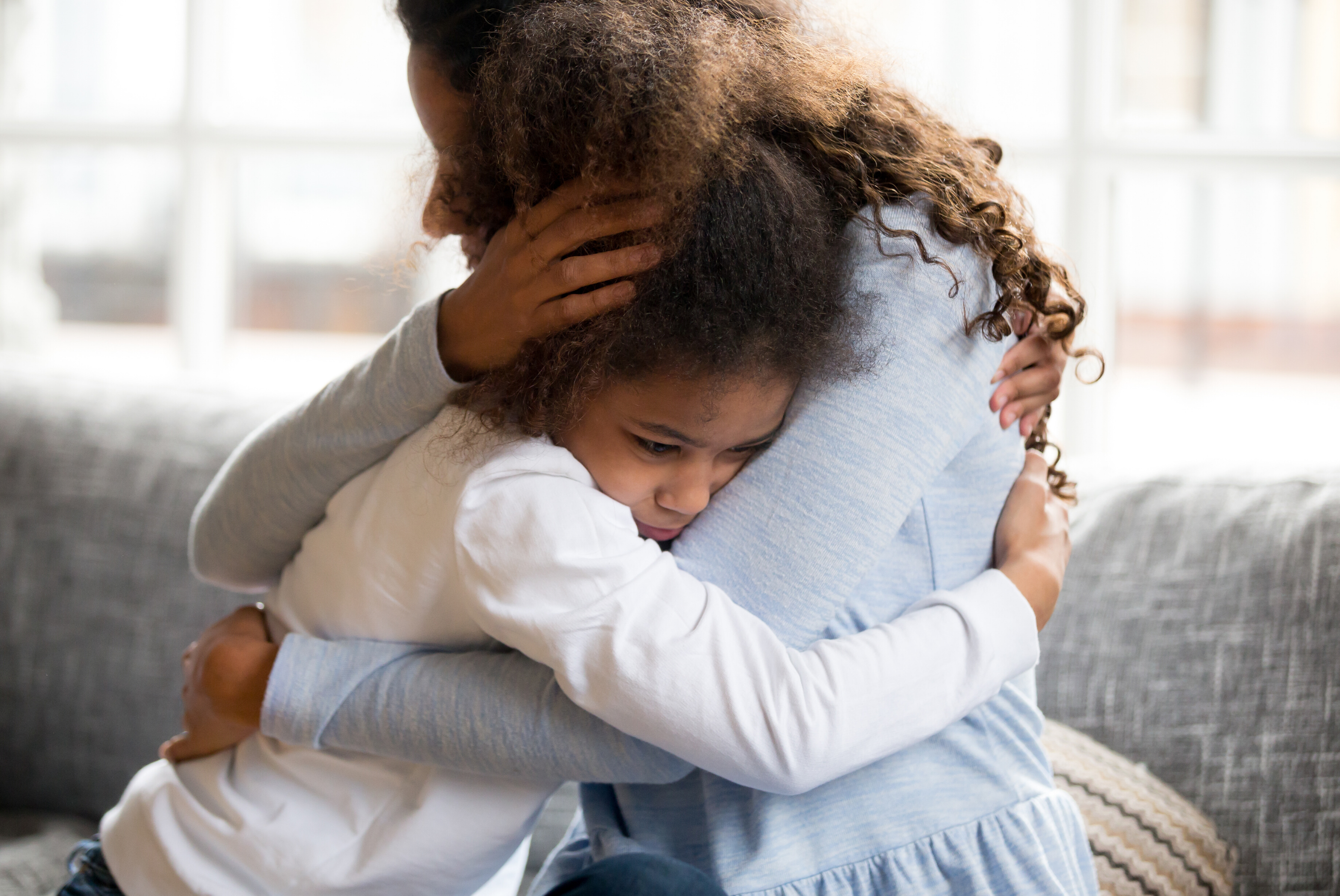 [Image: fizkes___Getty_Images_Pro_mother_hugging...ughter.png]