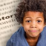 Photo illustration of a smiling child superimposed over an image of an open book.