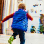 Child blurred because they're running.