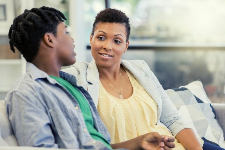 Mom talking to teen.