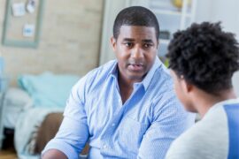 Father has serious talk with teenager at home