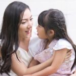 Mom comforting child