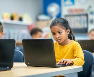 Young students on laptops