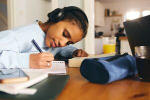 teen girl doing homework