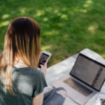 Teen girl scrolling on smartphone