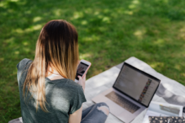 Teen girl scrolling on smartphone
