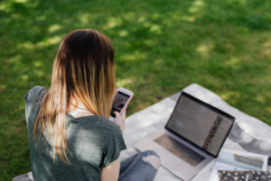 Teen girl scrolling on smartphone