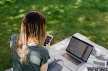 Teen girl scrolling on smartphone
