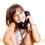 Kid on landline phone