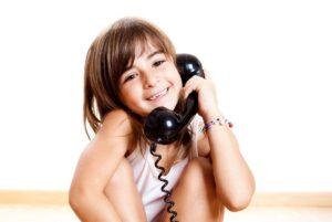 Kid on landline phone