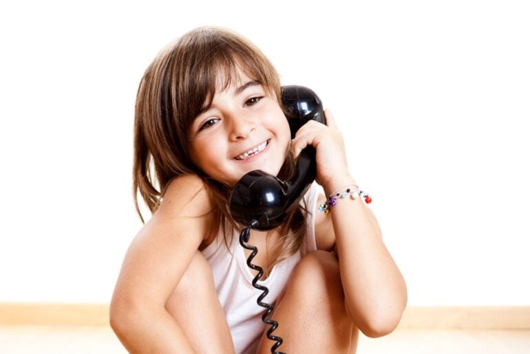 Kid on landline phone