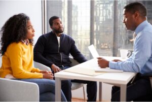 Couple meeting with attorney