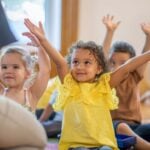Preschool kids following teacher