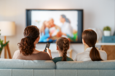 Family watching tv
