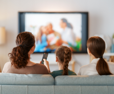Family watching tv