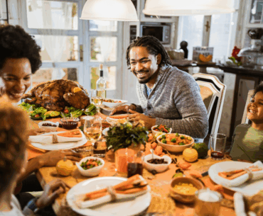 Family gathered around holiday table