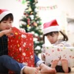 Kids unwrapping holiday presents
