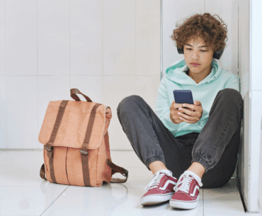 Teen boy on smartphone