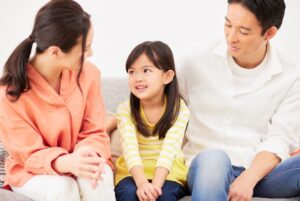 Child having conversation with parents