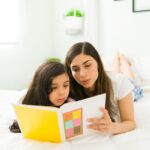 Mom and kid reading together