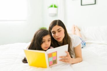 12 picture books featuring neurodivergent kids Mom and kid reading together