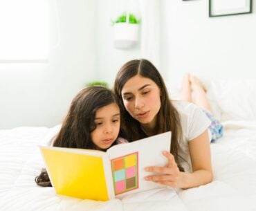 Mom and kid reading together