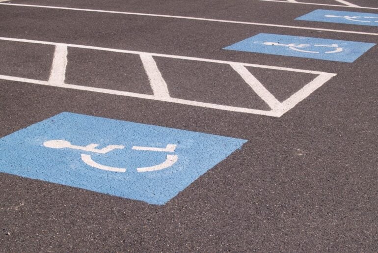 Behind the fight over expanding disability parking placards for pregnancy Handicapped parking spots