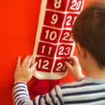 Kid using advent calendar