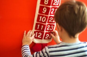 Kid using advent calendar