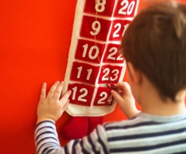 Kid using advent calendar