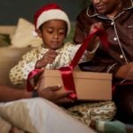 Kid unwrapping gift