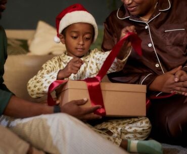 Kid unwrapping gift