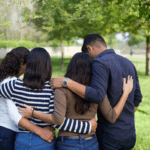 Loving family in embrace.