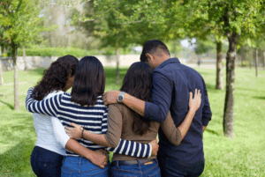 Loving family in embrace.