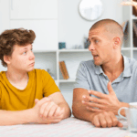 Father talking to teen son