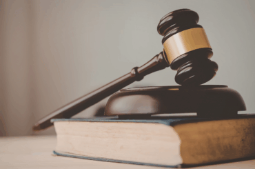 Landmark court decision finds Meta at fault for failing to protect children online Judge's gavel and law book