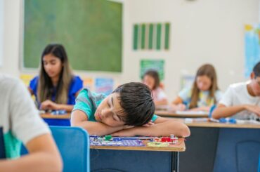 Student sleeping in class.
