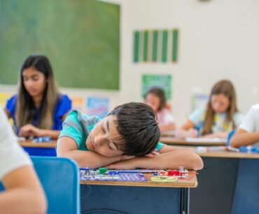 Student sleeping in class.