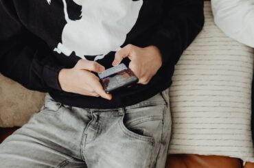Closeup of teen using smartphone