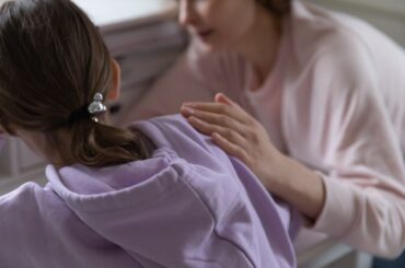 Parent talking to tween