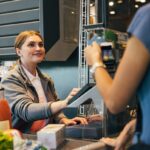 Cashier working at food store