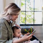 Worried mom consulting phone for answers
