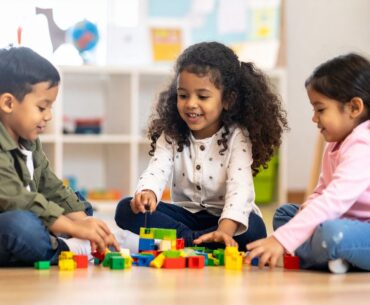 Preschool kids playing with blocks