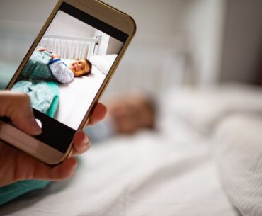 Taking photo of baby with smartphone