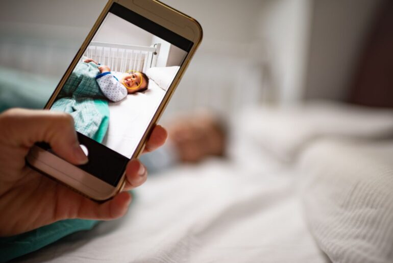 Facebook can access your entire camera roll — here’s how to turn off the setting Taking photo of baby with smartphone