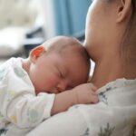 Mother holding newborn baby