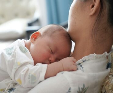 Mother holding newborn baby
