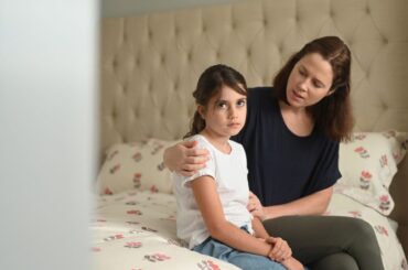 What to do when your child says “I hate school” Mom comforting upset child